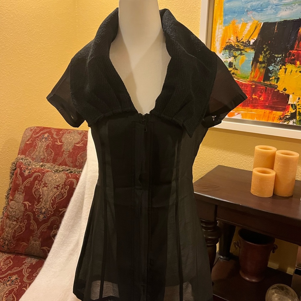 New Lanvie top small in black with tags.  Top can be worn as is or unzipped.